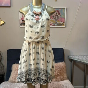 "Elephant Elegance: Black and White Dress with Playful Prints in Size Small